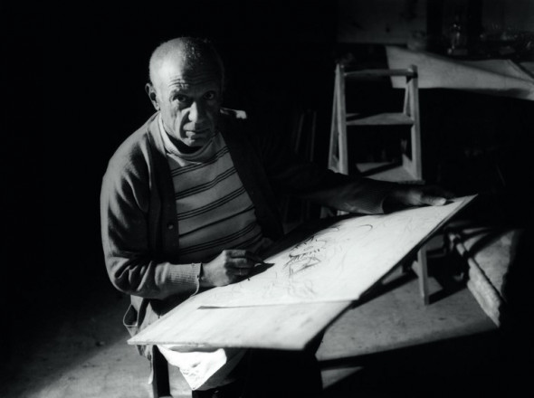 Pablo Picasso drawing in Antibes, summer 1946. Black-and-white photograph Photo © Michel Sima / Bridgeman Images © Succession Picasso/DACS 2019